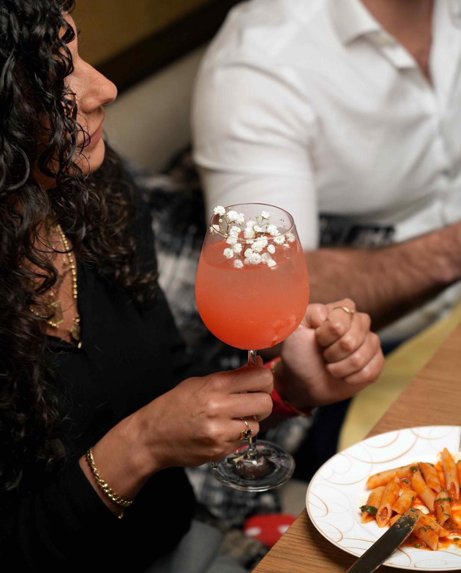 Fairmont Riyadh Bagian luar foto A glass of Kir royale